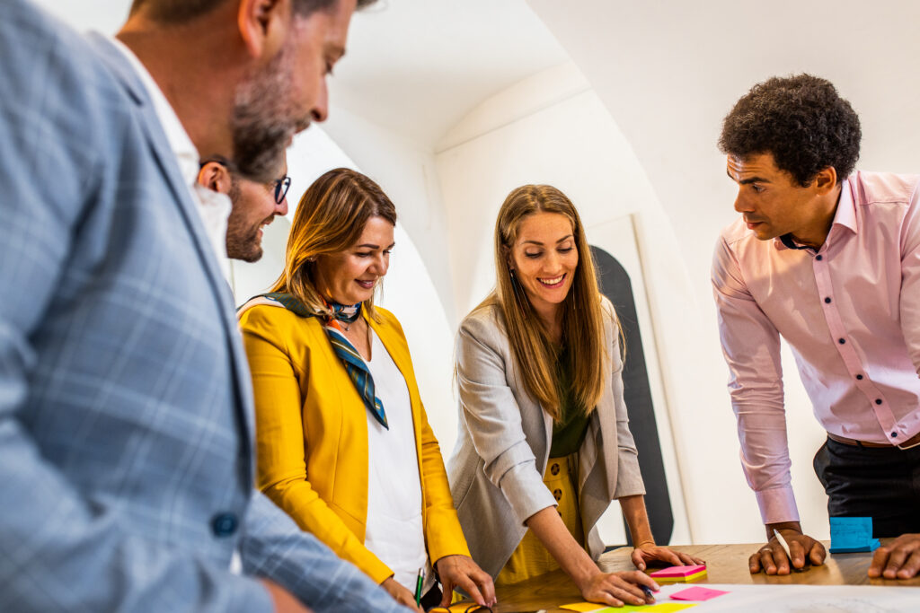 Group of business people working in office.