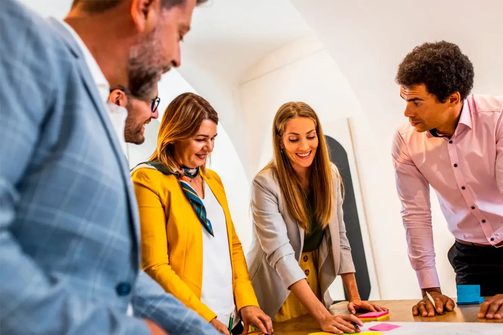 Group of business people working in office.
